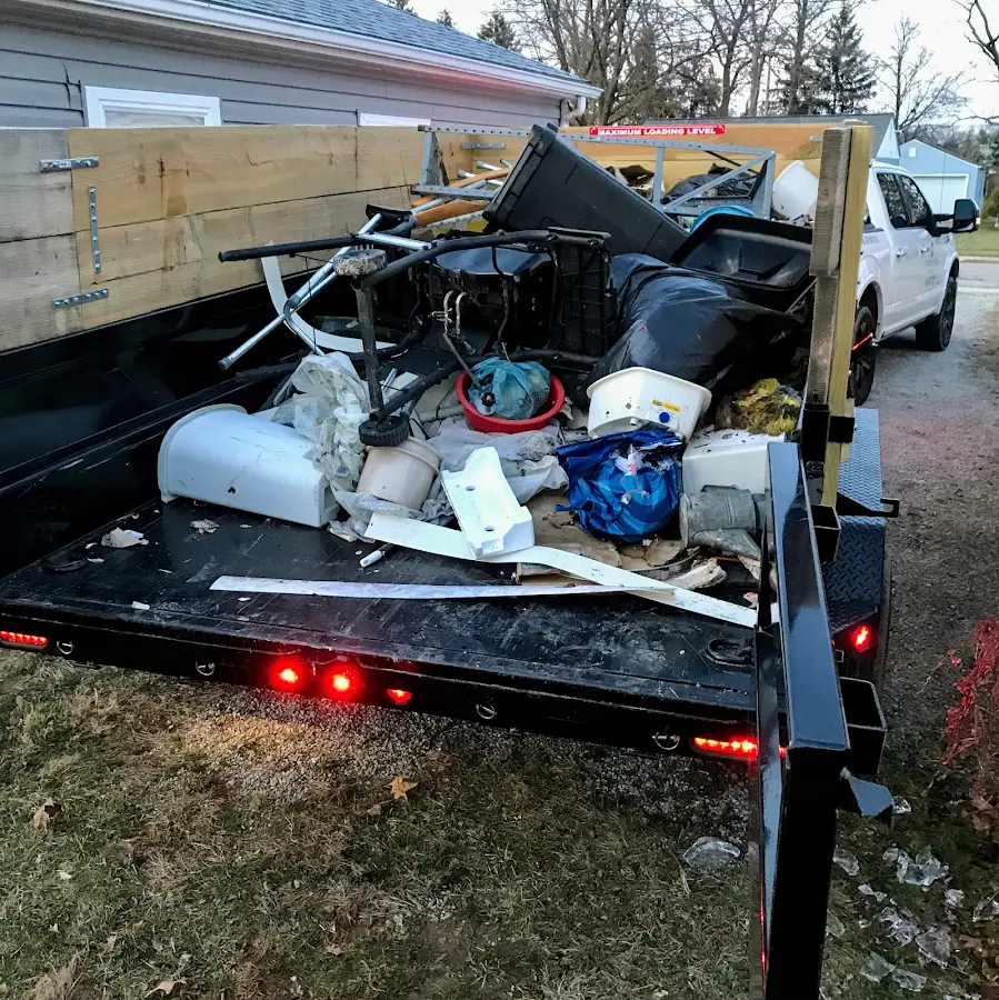 Roll-off dumpster delivered to a residential driveway in Meadow Woods