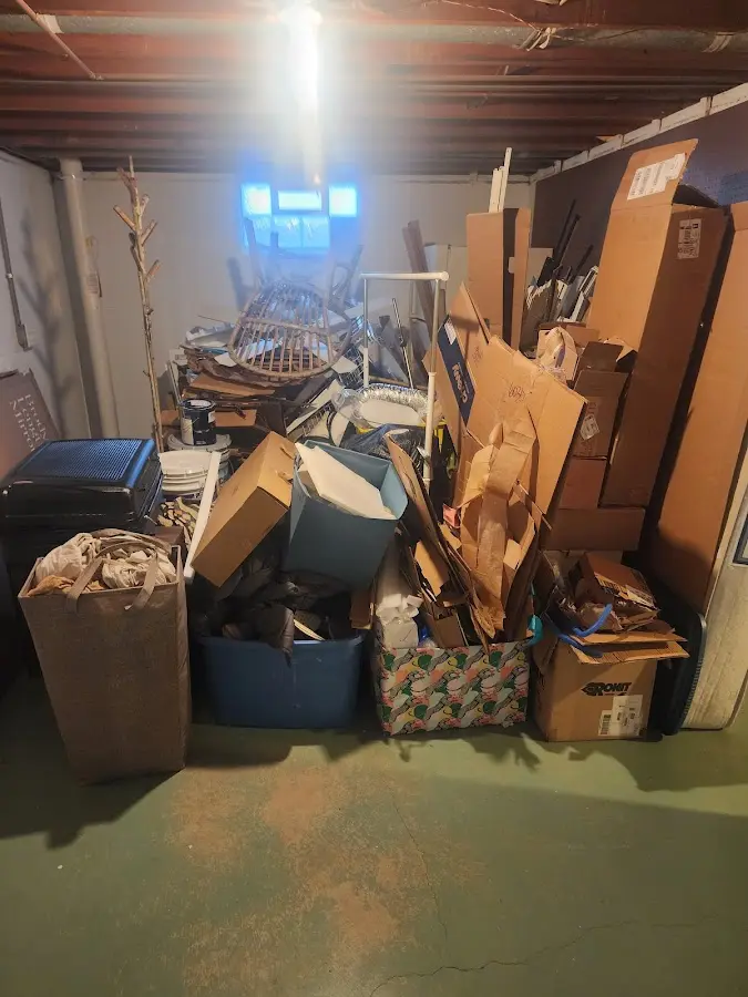 Roll-off dumpster container at job site for Yard Waste Dumpster Rental in Meadow Woods